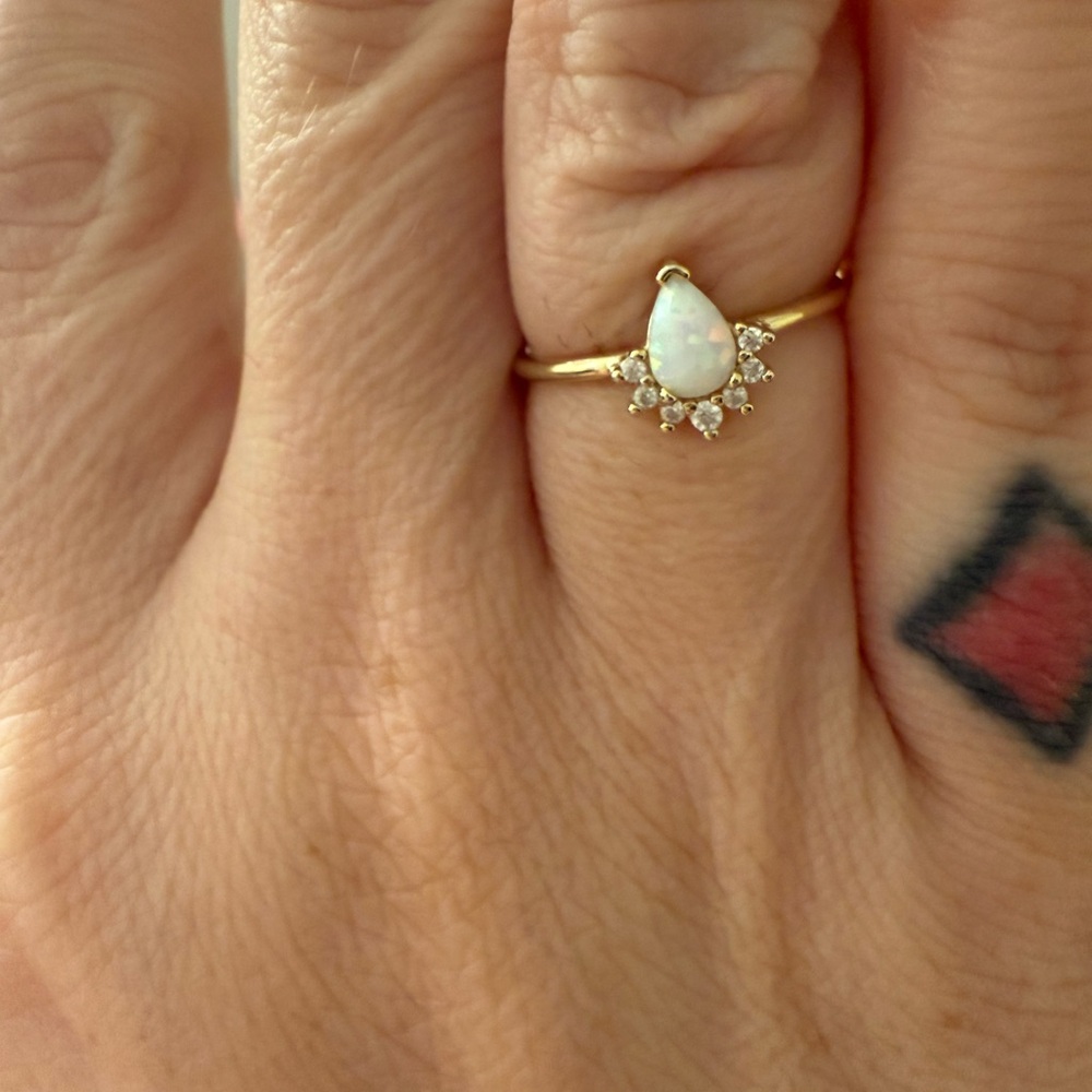 Elegant Gold and White Teardrop Ring